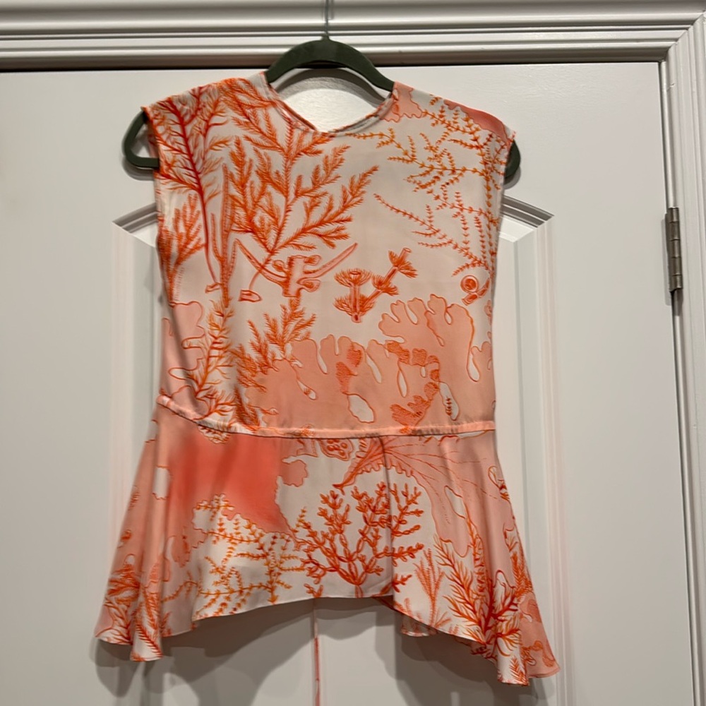 Stella McCartney silk coral peplum blouse with a since or tie waist